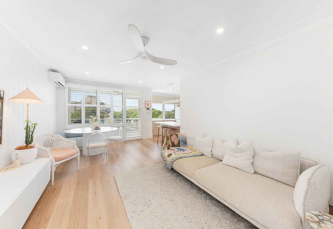 Immaculately Renovated East-Facing Apartment with Coastal Charm and Convenient Location